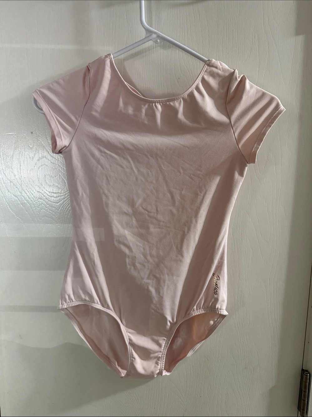 Justice Light Pink Short Sleeve One-Piece Bodysuit